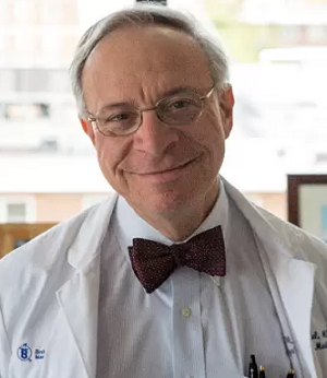 Dr Zeidel in bow tie and white coat