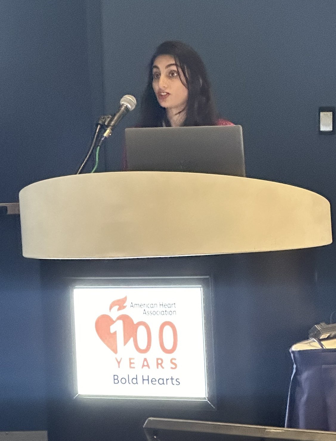 Anjali Bhatla presenting her winning research in the QCOR Early Career Investigator Competition - AHA 2024