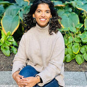 A professional headshot of Anna George