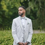 A professional headshot of Jaleta Ahmed