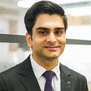 A professional headshot of Sumedh Kaul