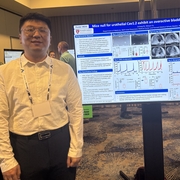 Dr. Jinliang Ni by his poster at SUFU meeting