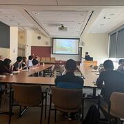 Photo of Dr. Masasuki Tsukasaki giving a lecture