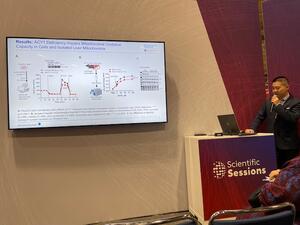 Yuntian Guan presenting at a conference