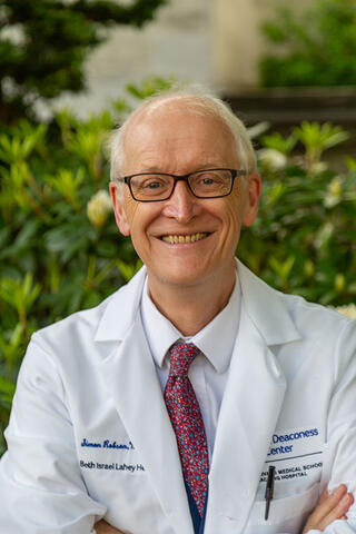 Simon C. Robson, MBChB, PhD, FCRP