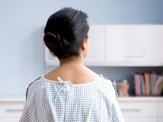 A patient in a medical gown