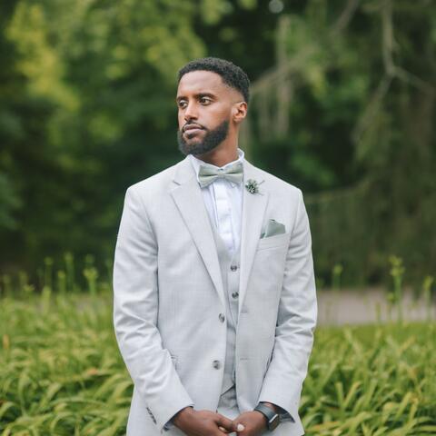 A professional headshot of Jaleta Ahmed