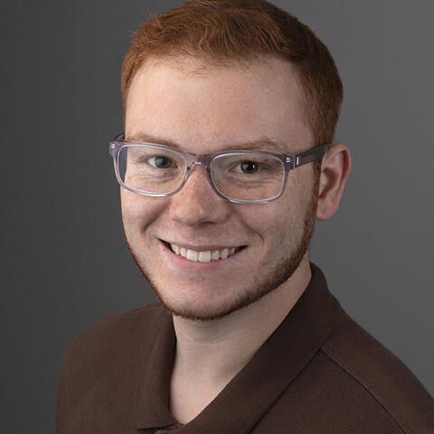 A professional headshot of Mark Rotondo
