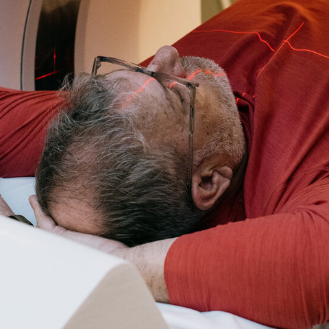 A Man Laying in an MRI Machine 
