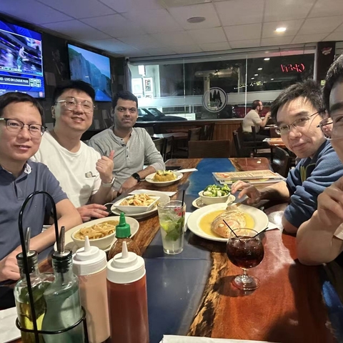 Yu lab enjoying dinner together