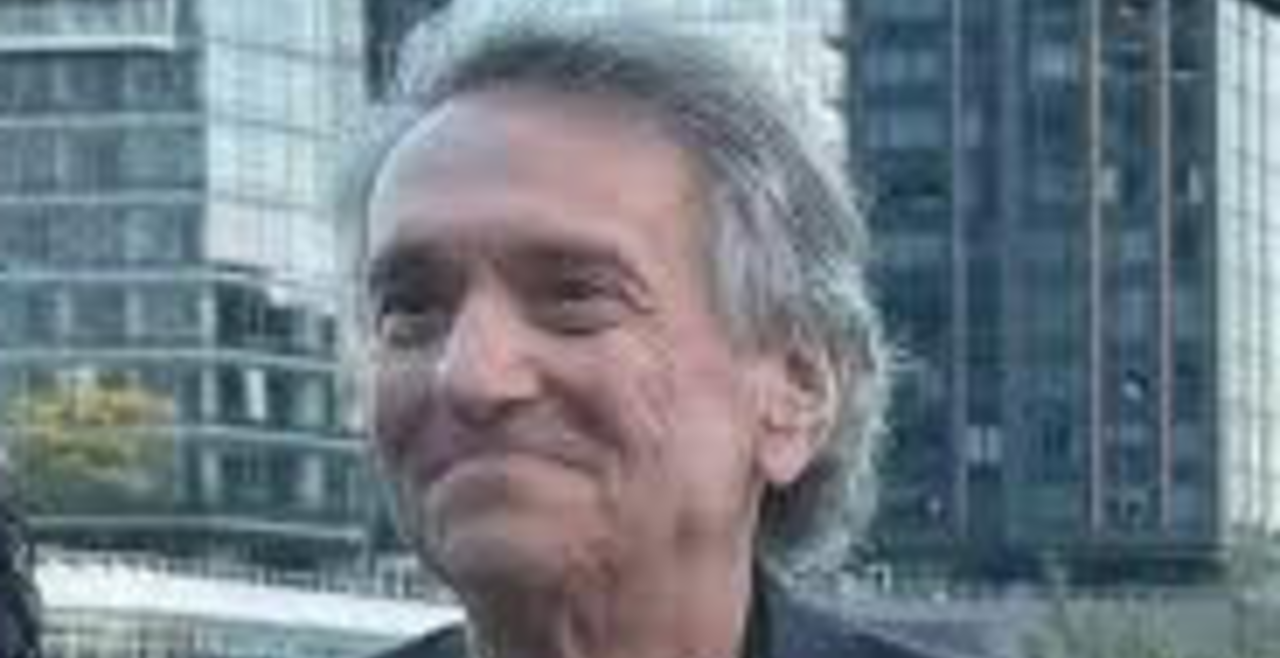 Dr. Alexander Ebralidze, a respectable and handsome gentleman with grey hair.