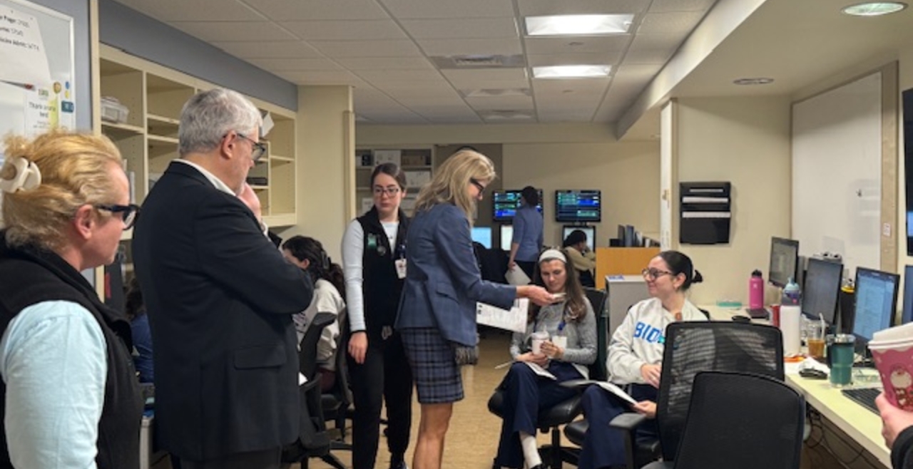 Drs. Fick and Marcantonio talking with nurses