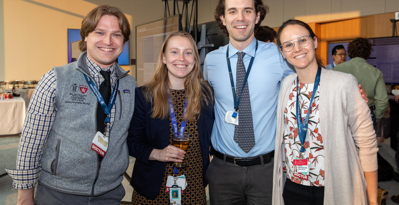 Residents in a group picture at Resident Research Night