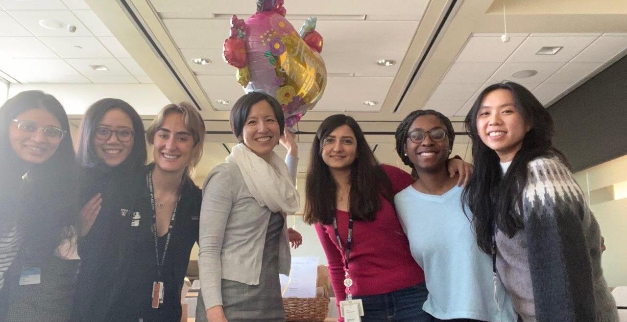 Lab group celebrating a birthday