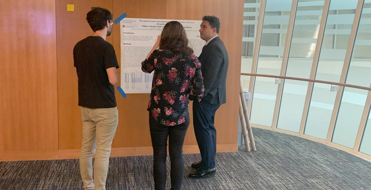 Photo of postdoctoral fellows at poster session