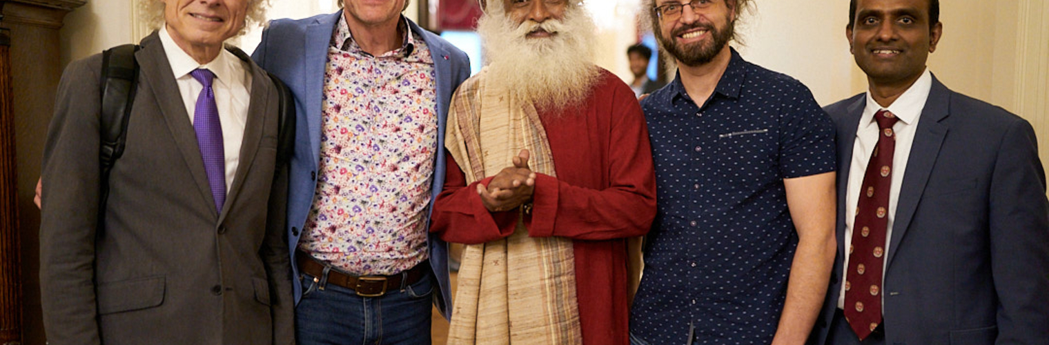 Sadhguru with Consciousness Conference speakers.