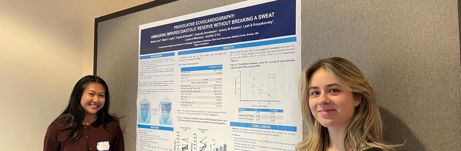 Maria and Sophie presenting their poster