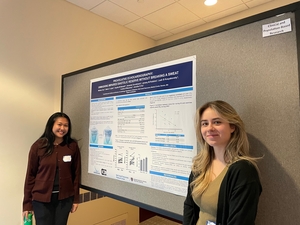 Maria and Sophie presenting their poster